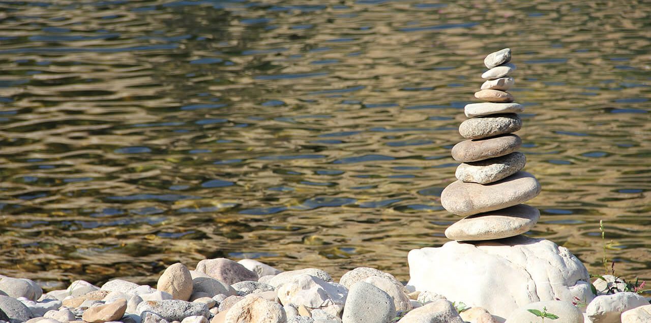 Stacked Stones by river