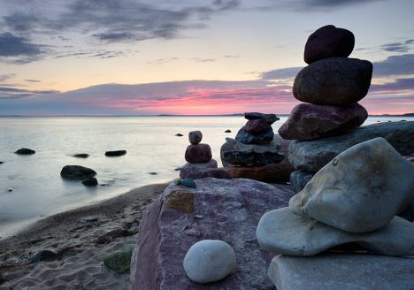 cairn rocks beach water sea sunset calm wave relaxation