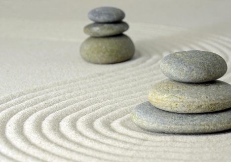 cairn rocks sand waves lines drawn relaxed calm